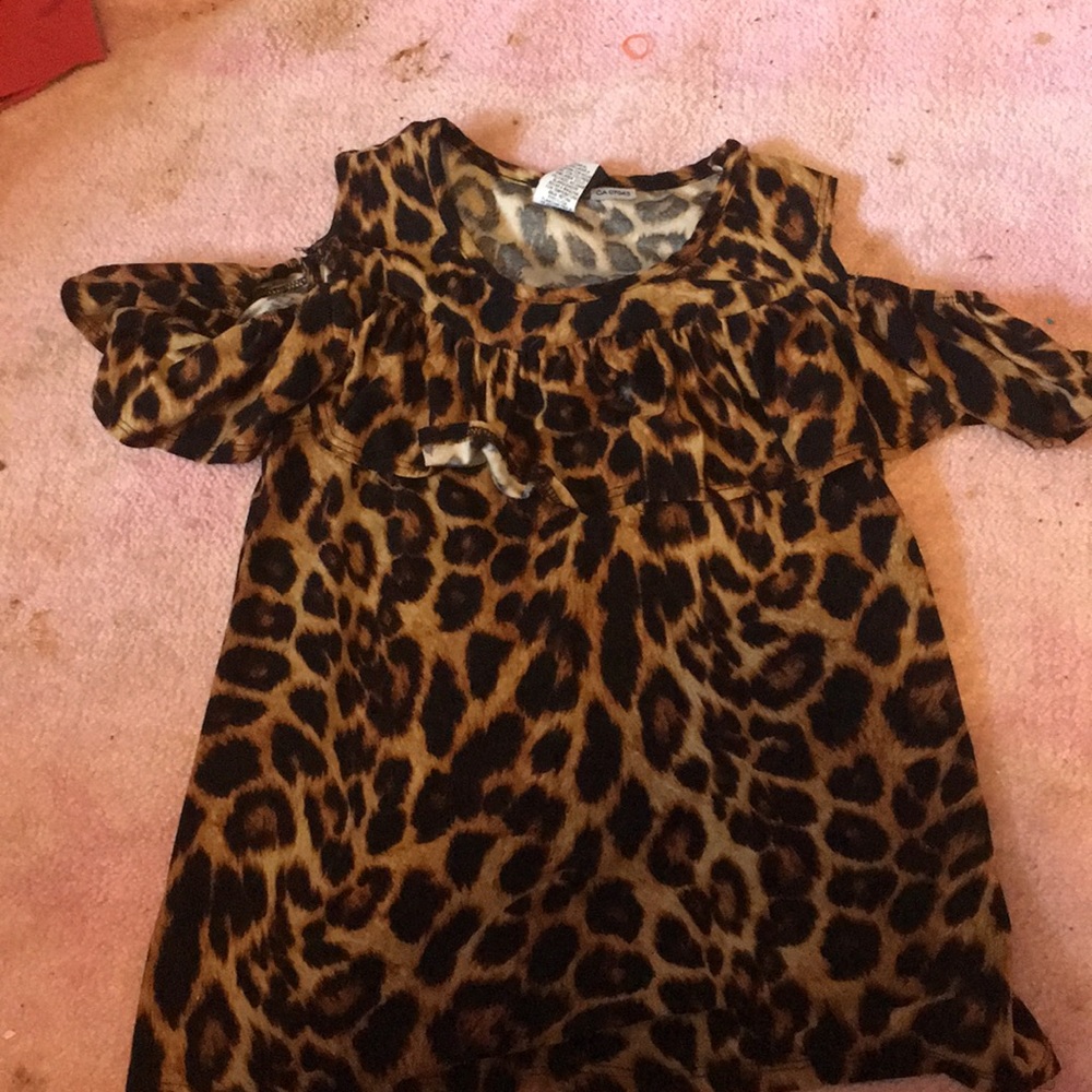 Ruffled off the shoulder cheetah print top.
